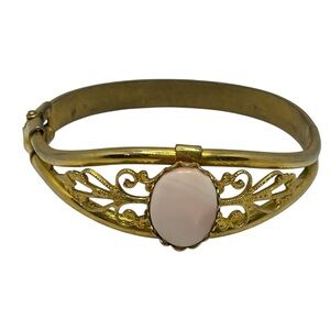 Filigree scroll clamper hinge bracelet gold tone pale pink cabochon vintage